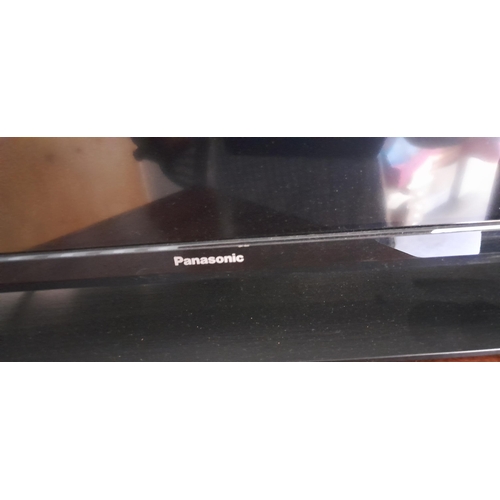 206 - Panasonic LED television, Samsung television and DVD player with remotes