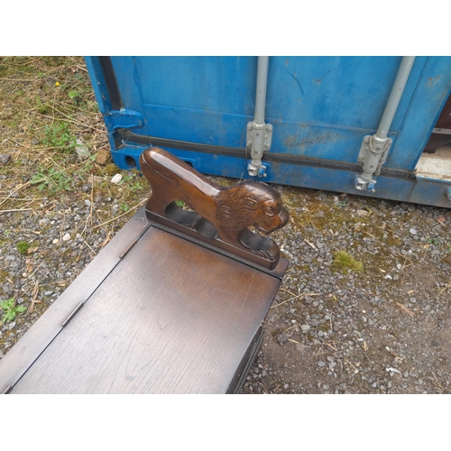 235 - Vintage oak telephone table with carved lion arm rest