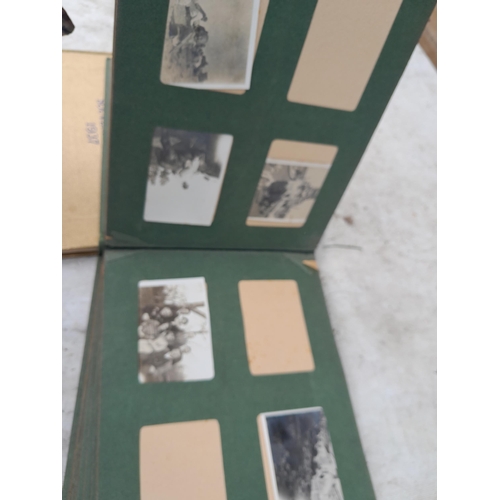 253 - Commemorative Souvenir Album, 2 x partially and sparsely filled black and white family photograph al... 