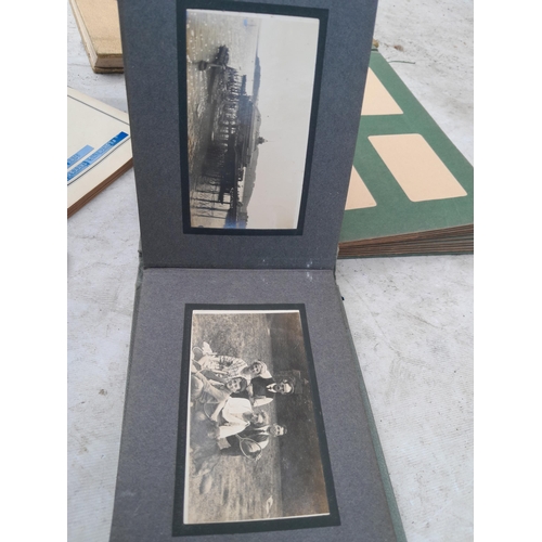 253 - Commemorative Souvenir Album, 2 x partially and sparsely filled black and white family photograph al... 