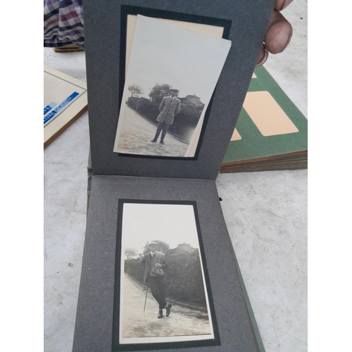 253 - Commemorative Souvenir Album, 2 x partially and sparsely filled black and white family photograph al... 