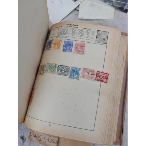 254 - Stamps : Stamps from the World used and mint in a partially filled album, earlier stamps noticed