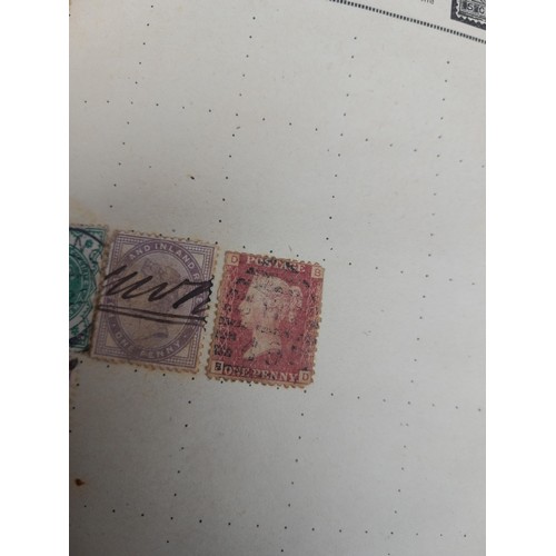 254 - Stamps : Stamps from the World used and mint in a partially filled album, earlier stamps noticed