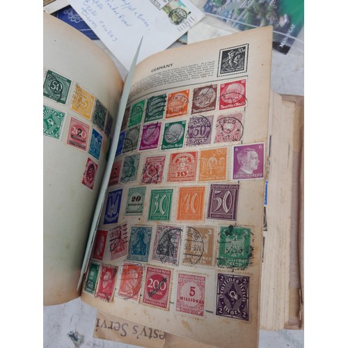 254 - Stamps : Stamps from the World used and mint in a partially filled album, earlier stamps noticed