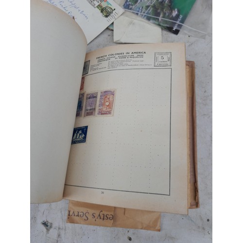 254 - Stamps : Stamps from the World used and mint in a partially filled album, earlier stamps noticed