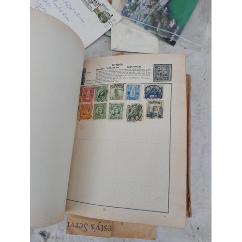 254 - Stamps : Stamps from the World used and mint in a partially filled album, earlier stamps noticed