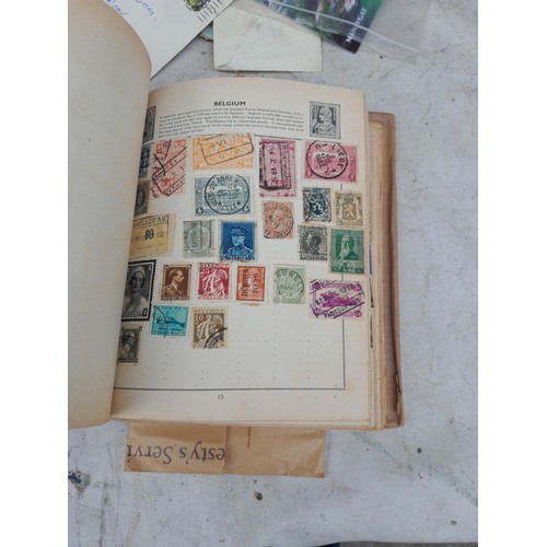 254 - Stamps : Stamps from the World used and mint in a partially filled album, earlier stamps noticed