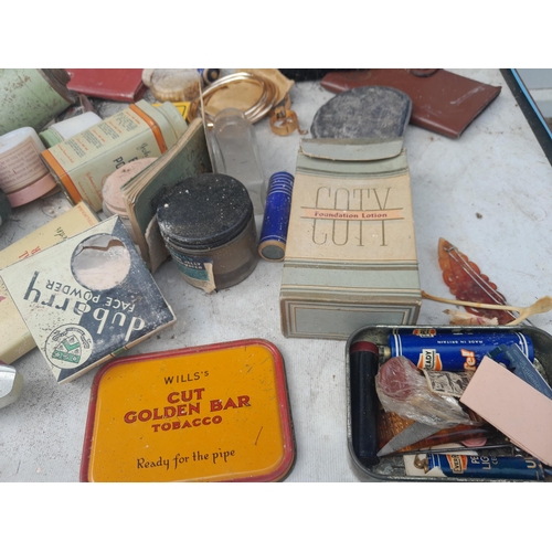 32 - Vintage advertising bottles, perfumes, make up , tins etc.