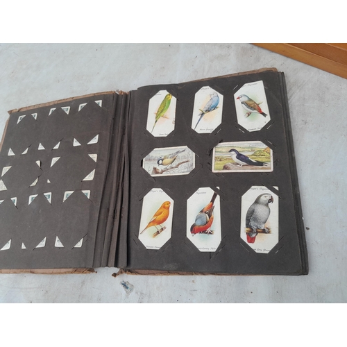 141 - Cigarette cards in album, ship in a bottle and wooden pencil case & 2 x brief cases