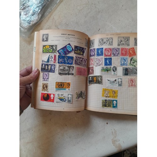 306 - Sparsely filled album of used stamps of the world and loose mint and used stamps