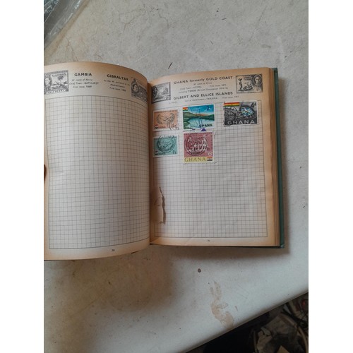 306 - Sparsely filled album of used stamps of the world and loose mint and used stamps