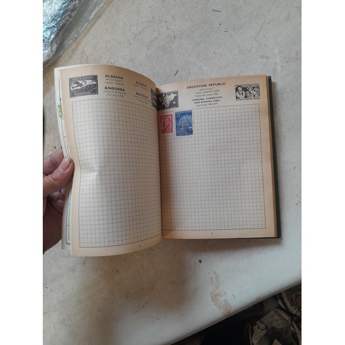 306 - Sparsely filled album of used stamps of the world and loose mint and used stamps