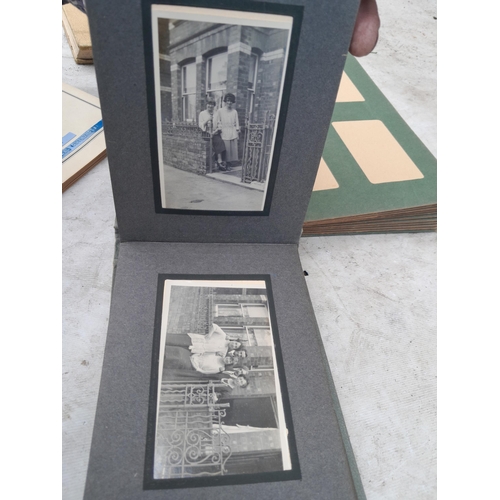 405 - Commemorative Souvenir Album, 2 x partially and sparsely filled black and white family photograph al... 