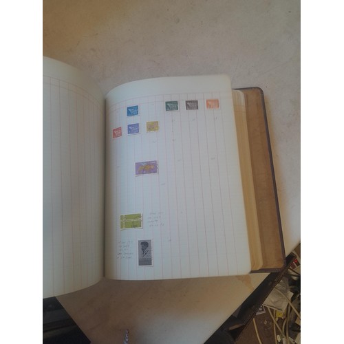 428 - Stamps : approx 8 kg of stamps, 1 x album of used and mint stamps of the world, Gay Venture and Nobb... 