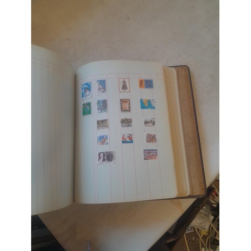 428 - Stamps : approx 8 kg of stamps, 1 x album of used and mint stamps of the world, Gay Venture and Nobb... 