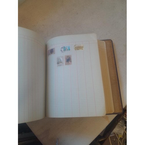 428 - Stamps : approx 8 kg of stamps, 1 x album of used and mint stamps of the world, Gay Venture and Nobb... 