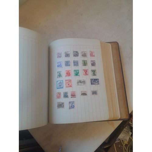 428 - Stamps : approx 8 kg of stamps, 1 x album of used and mint stamps of the world, Gay Venture and Nobb... 