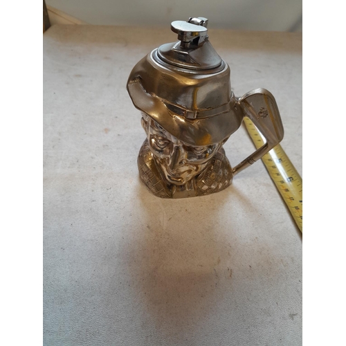 575 - Viners silver plated table lighter modelled as a Golfer