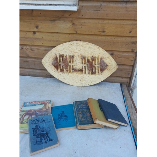 40 - Tourist Masai shield, vintage books, Lacross stick etc.