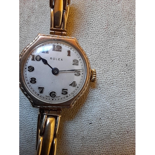 47 - Vintage ladies Rolex evening watch, with 9ct gold articulated strap and 9 ct gold case in presentati... 