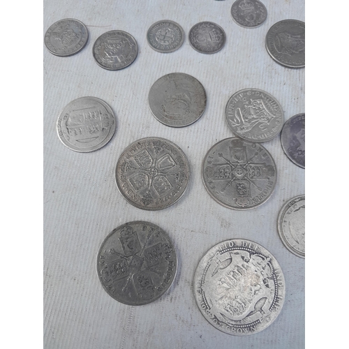 64 - Coins : mixed UK silver coinage, grading varies considerably but nicer coins noticed