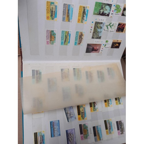 4 - Assorted stamp stock books and loose pages with mint and used QEII era Commonwealth, badly stored wi... 