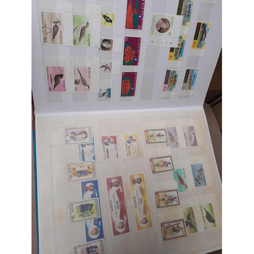 4 - Assorted stamp stock books and loose pages with mint and used QEII era Commonwealth, badly stored wi... 