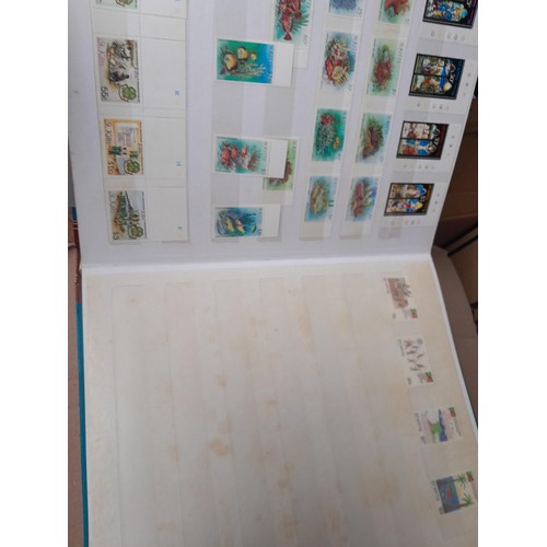 4 - Assorted stamp stock books and loose pages with mint and used QEII era Commonwealth, badly stored wi... 