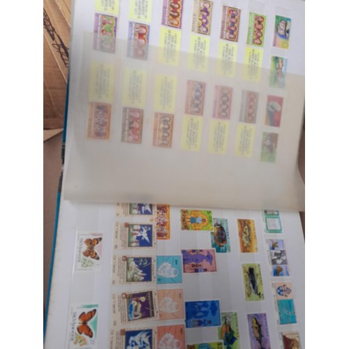 4 - Assorted stamp stock books and loose pages with mint and used QEII era Commonwealth, badly stored wi... 