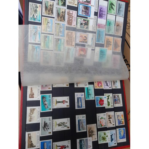 4 - Assorted stamp stock books and loose pages with mint and used QEII era Commonwealth, badly stored wi... 