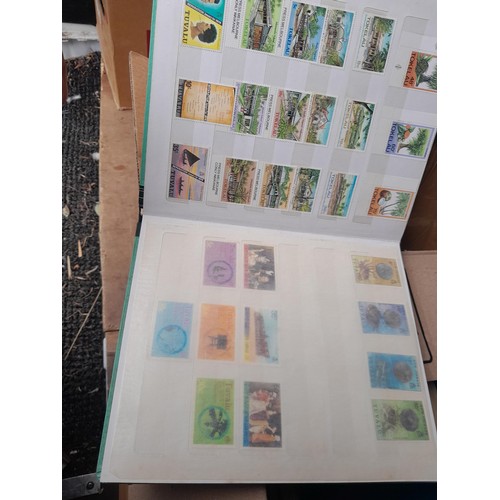 4 - Assorted stamp stock books and loose pages with mint and used QEII era Commonwealth, badly stored wi... 