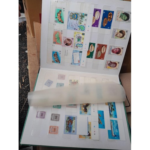 4 - Assorted stamp stock books and loose pages with mint and used QEII era Commonwealth, badly stored wi... 