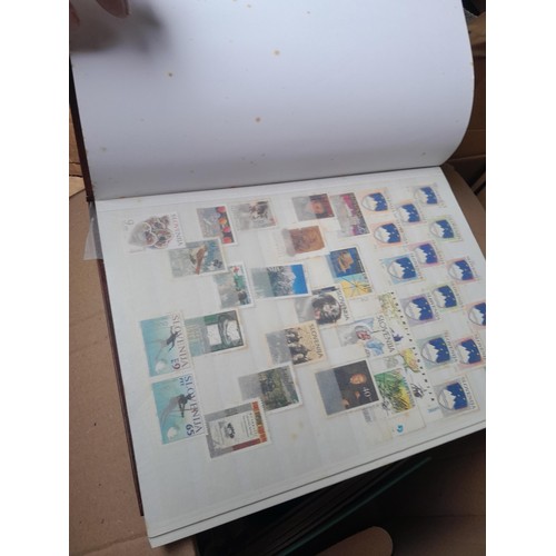 4 - Assorted stamp stock books and loose pages with mint and used QEII era Commonwealth, badly stored wi... 