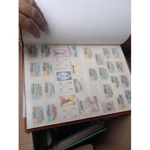 4 - Assorted stamp stock books and loose pages with mint and used QEII era Commonwealth, badly stored wi... 