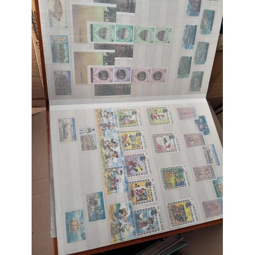 4 - Assorted stamp stock books and loose pages with mint and used QEII era Commonwealth, badly stored wi... 