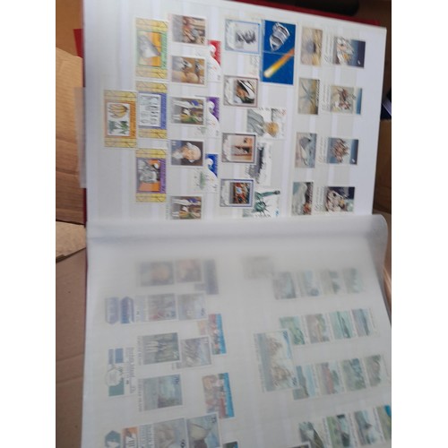 4 - Assorted stamp stock books and loose pages with mint and used QEII era Commonwealth, badly stored wi... 