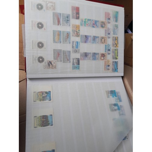 4 - Assorted stamp stock books and loose pages with mint and used QEII era Commonwealth, badly stored wi... 