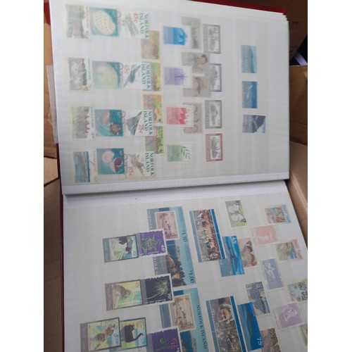 4 - Assorted stamp stock books and loose pages with mint and used QEII era Commonwealth, badly stored wi... 