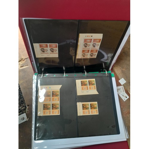 5 - Stamps of Rhodesia in four volumes, includes modern unmounted mint and earlier used