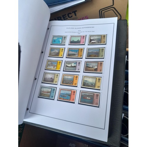 7 - Stamps of South Atlantic in 7 x blue binders with printed pages for all issues to 2014 for Falklands... 