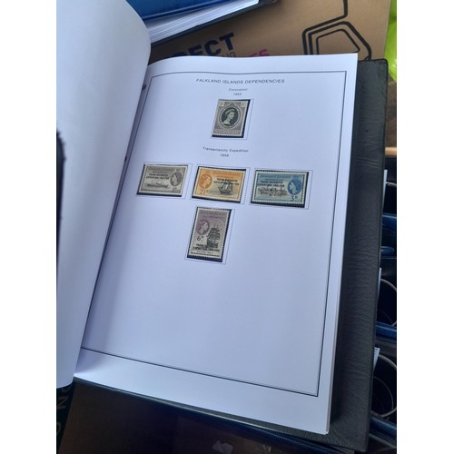 7 - Stamps of South Atlantic in 7 x blue binders with printed pages for all issues to 2014 for Falklands... 