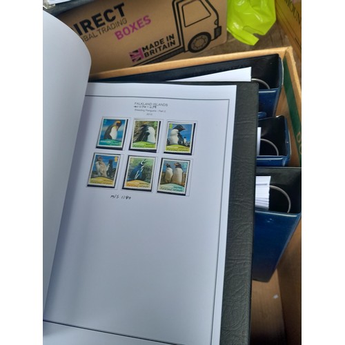 7 - Stamps of South Atlantic in 7 x blue binders with printed pages for all issues to 2014 for Falklands... 