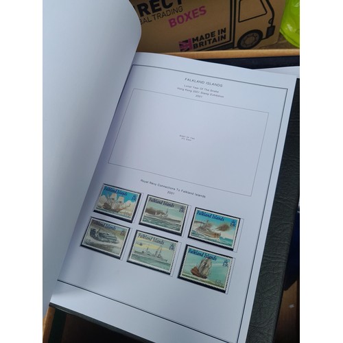 7 - Stamps of South Atlantic in 7 x blue binders with printed pages for all issues to 2014 for Falklands... 