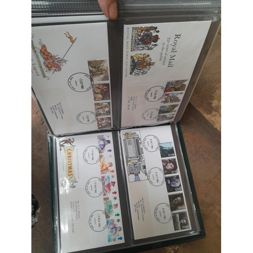 8 - Stamp First Day covers in 2 x Royal Mail and 2 x Kestrel albums