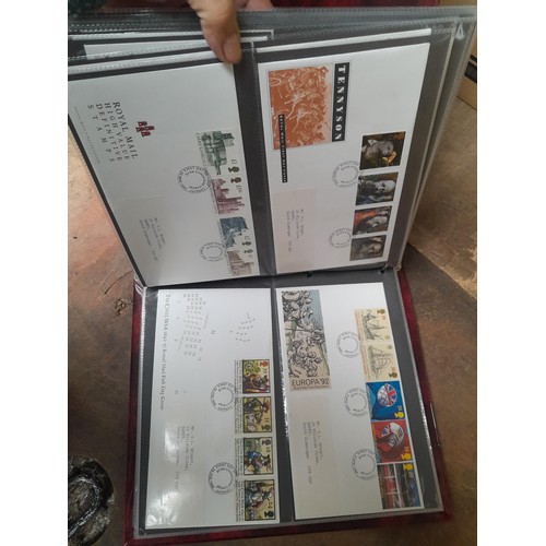 8 - Stamp First Day covers in 2 x Royal Mail and 2 x Kestrel albums