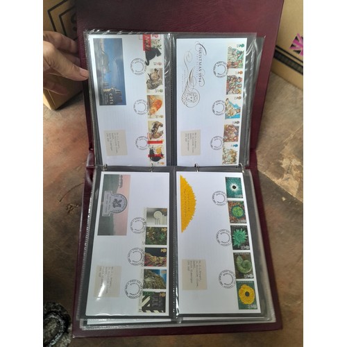 8 - Stamp First Day covers in 2 x Royal Mail and 2 x Kestrel albums