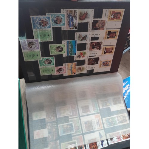 15 - Assorted stamp stock books and loose pages with mint and used QEII era Commonwealth, badly stored wi... 