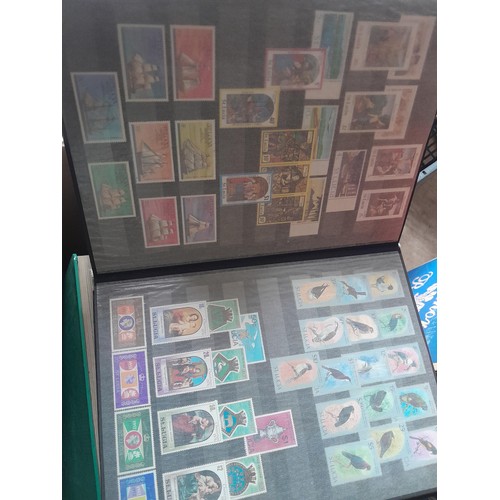 15 - Assorted stamp stock books and loose pages with mint and used QEII era Commonwealth, badly stored wi... 