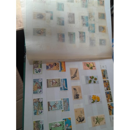 15 - Assorted stamp stock books and loose pages with mint and used QEII era Commonwealth, badly stored wi... 