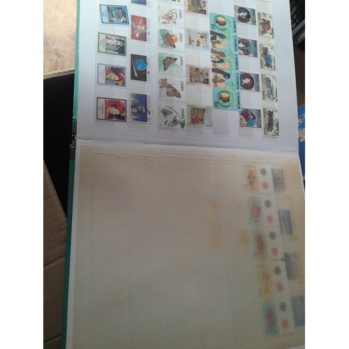 15 - Assorted stamp stock books and loose pages with mint and used QEII era Commonwealth, badly stored wi... 